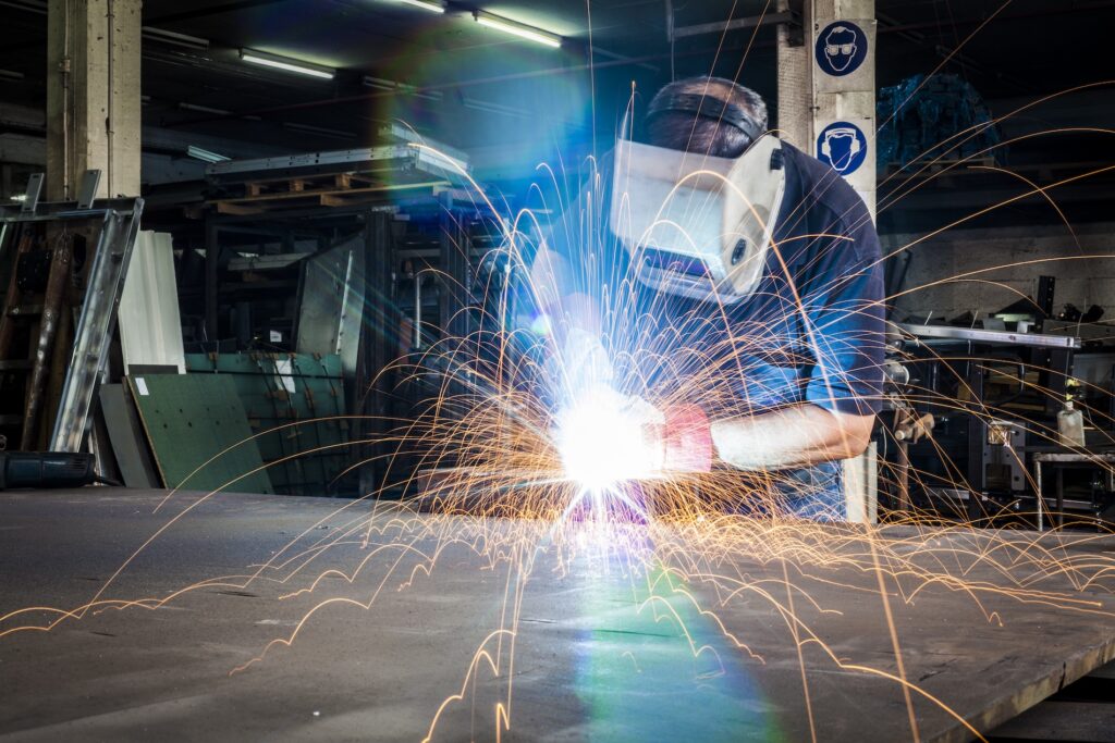 industrial worker welding with protective gear in 2026 03 09 06 34 16 utc